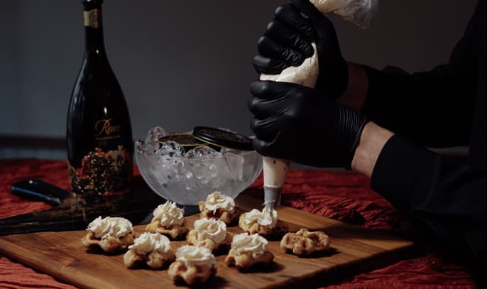 Private chef dinner with savory waffle and champagne